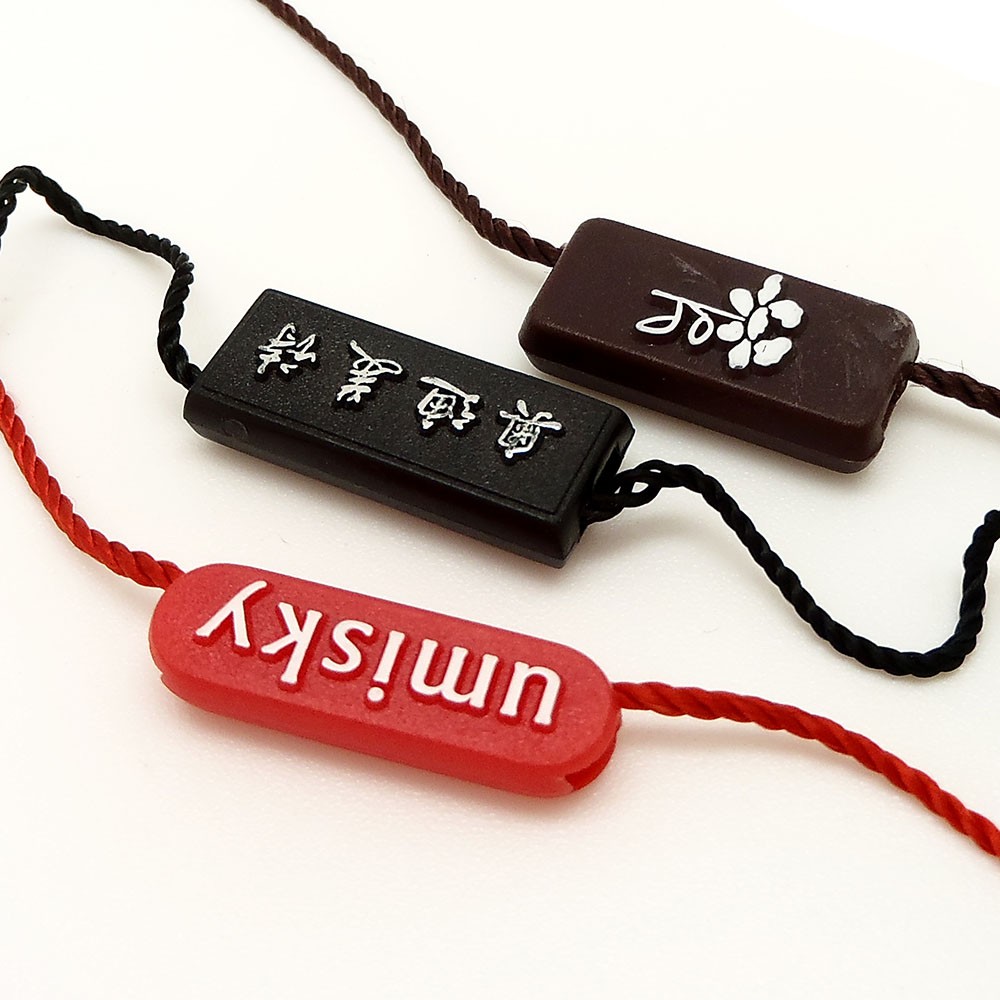 服裝午夜福利视屏之吊牌吊粒